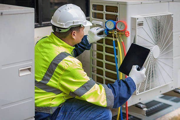 Professional Heat Pump Repair technician working in Bruceville, TX